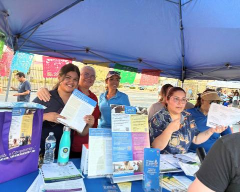 Promotoras tabling event