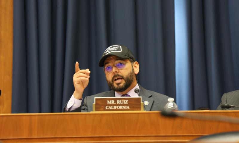 Rep. Raul Ruiz wearing a Jimmy Kimmel Live! Hat in Committee